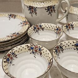 TEA. POT. with Cups & Saucers