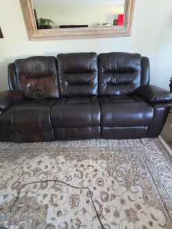 Free dark  brown leather couch not electric
