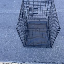 Dog Cage For Sale 25:00 Dollars Firm Price Good Condition Except Bottom Plastic Not Perfect But It Will Do The Job Thanks 