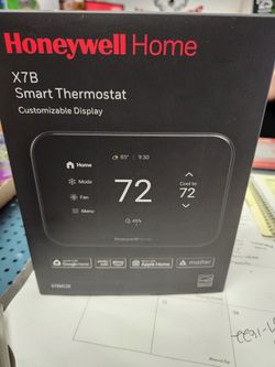 Honeywell Home black smart compatible thermostat.