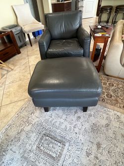 Natuzzi leather chair and ottoman