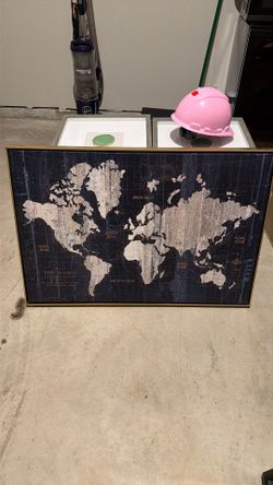 Globe picture. Gold frame
