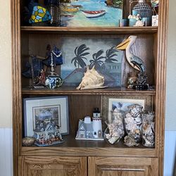 Tall solid beautiful shelving unit with built-in light with switch