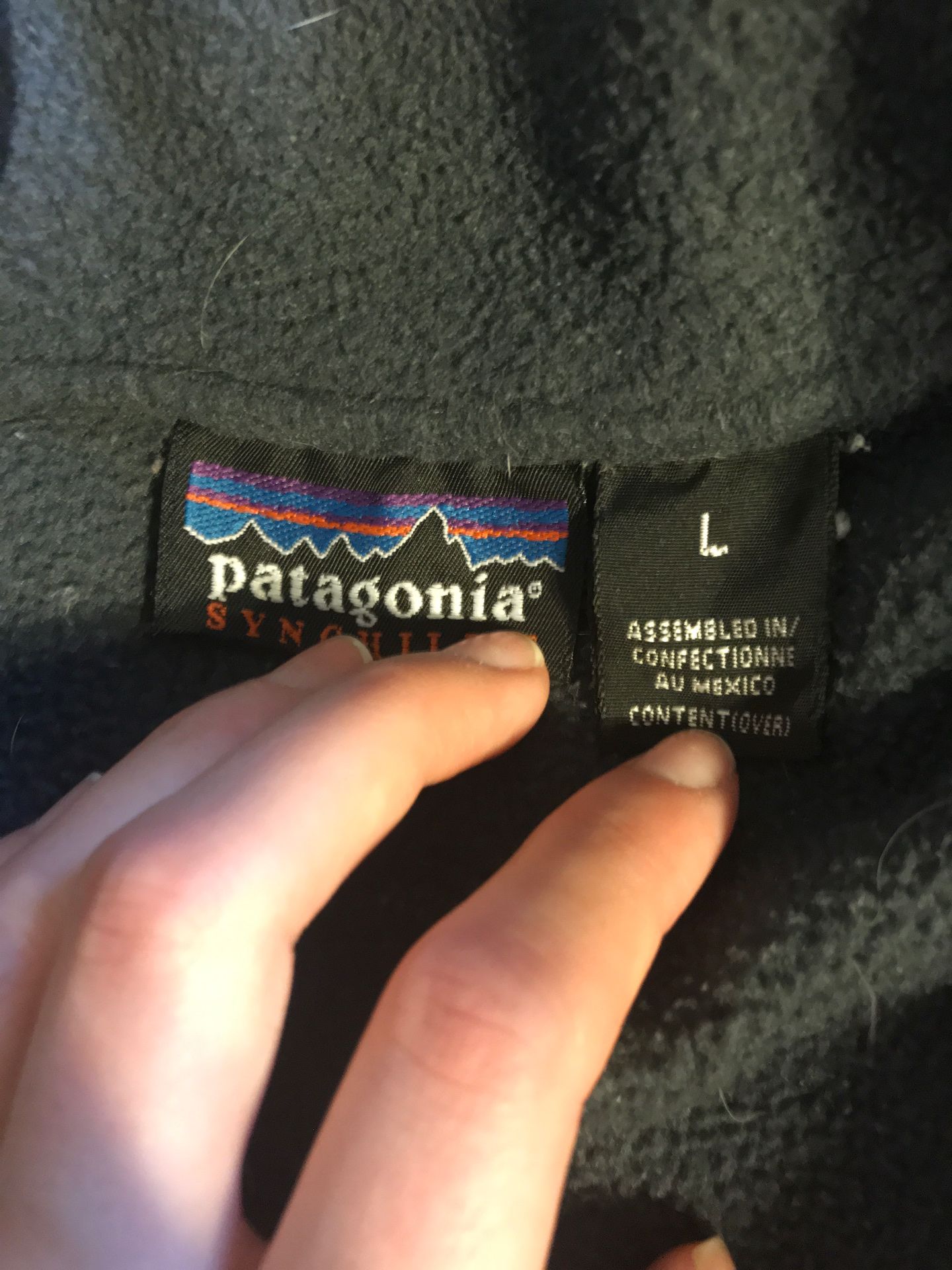 Women’s large Patagonia half zip navy blue sweater