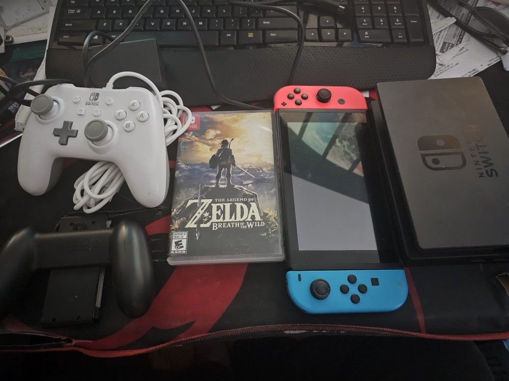 Nintendo Switch RED/BLUE 225GB + Controller + Zelda Breath Of The Wild