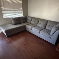 Ashley Furniture Sectional Sofa With Pull Out Bed - Seats 6-7 Comfortably 