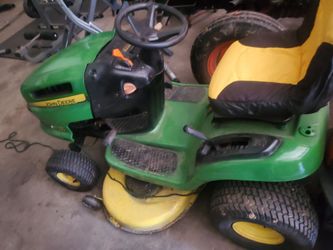 John deere riding  mower,42in deck, 21hp engine, runsand mows