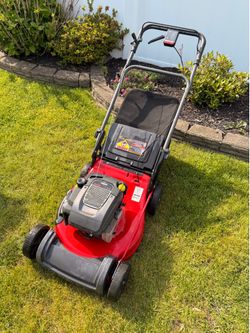 Self propelled lawn mower
