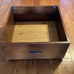Under Bed Wooden Organizer With Wheels. Dimensions are; 24-1/2”X24-1/2” X11-1/4”