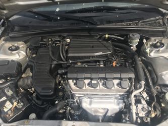 2003 Honda Civic 4 puertas 4 cilindro en buena condiciónes automático salvaje millas 142877