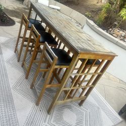 Patio Table, Stools And Rug