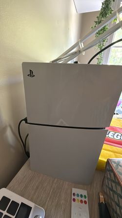 Practically brand new ps5 with 2 controllers and lots of games