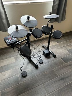 Kids Alexsis electric drum set 34” tall