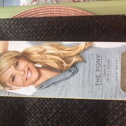 NewPonytail Christie Brinkley never out-of-the-box