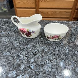 Vintage St. George Fine Bone China Creamer & Sugar . Creamer Size approximately 3 inches tall and 4 inches wide. Preowned excellent condition. Has