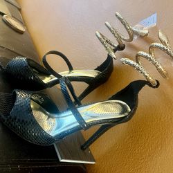 Black and Gold High Heels with Unique Design