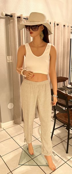 Adorable tan/bone, silky baggy pants with gold zipper on the side and ankle ties with slit (12/XL)