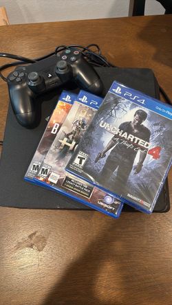 PlayStation 4 (with controller and three games)