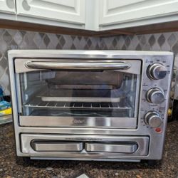 Toaster Oven With Convection, Toaster, Broiler, Pizza drawer, Turbo Setting.  
