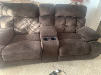 Movie reclining couch with cup holders