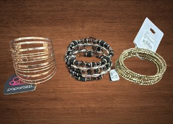 BUNDLE OF 3 WRAPAROUND BRACELETS 2 gold tone 1 black.