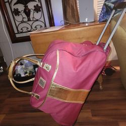 Ladies NEW DIRECTIONS Wild Berry Roller Carryon $20