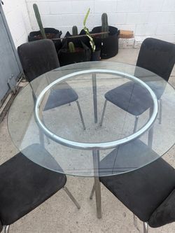 GLASS DINING TABLE