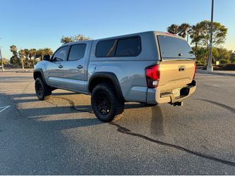 Snugtop camper shell Toyota Tacoma cement grey