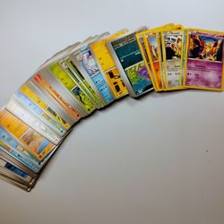 Pokémon Card Lot – 120+ Base Cards with Case & Mew Token  