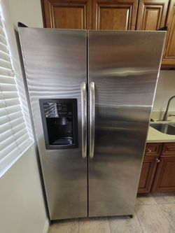 GE 25.5 Cu. Ft. Stainless steel refrigerator.  Works perfectly.