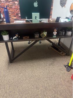 Office desk and fridge and wall pictures $350