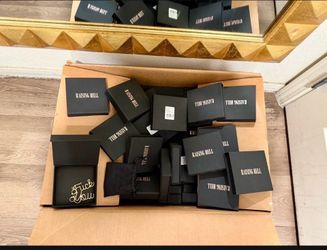 Box with more than 100 earings for resale!! FUCK YOU earrings new in box!!
