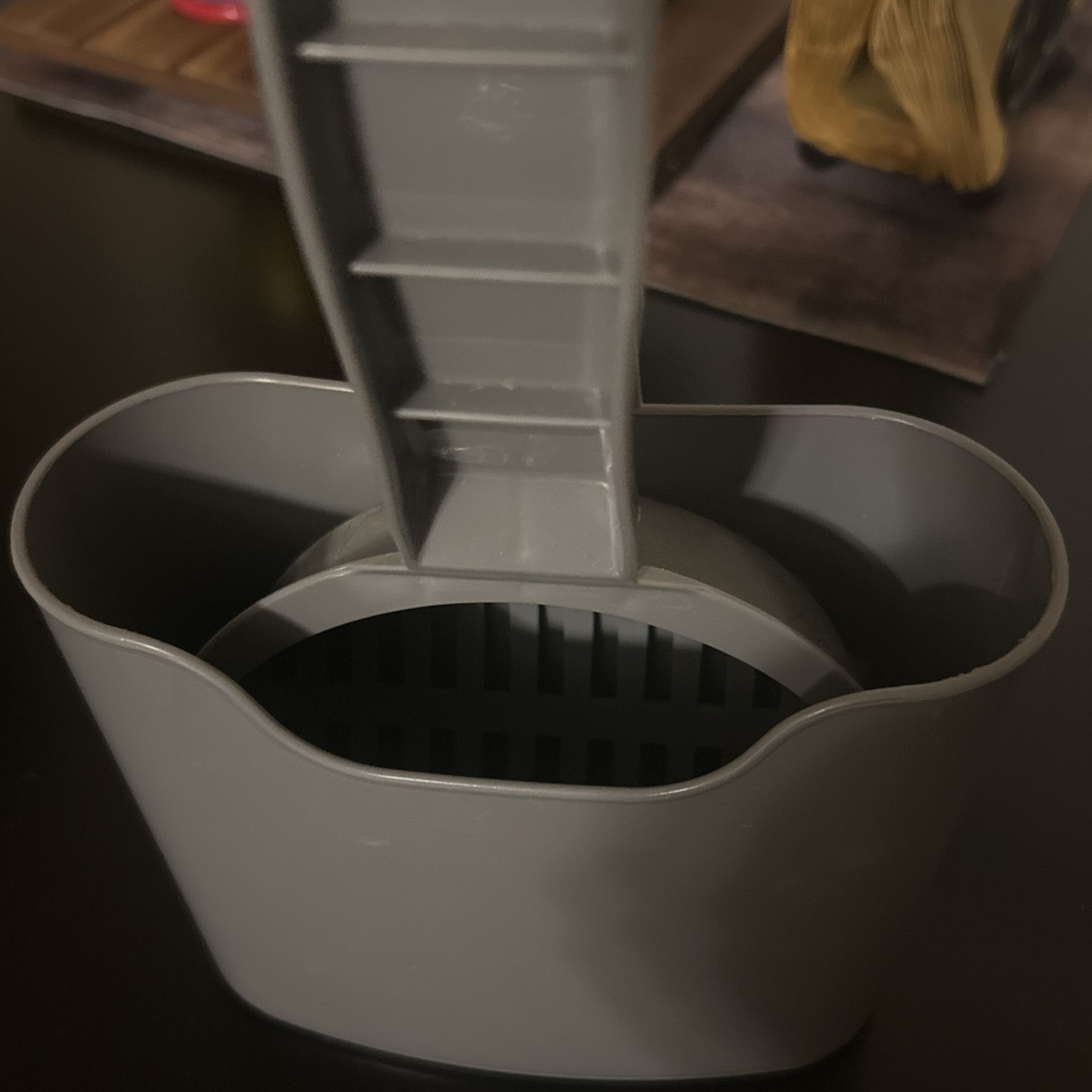 Two cat scoopers, one sweeper, two litter filters