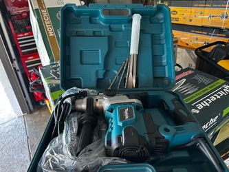 New Makita rotary hammer drill. Try before you buy. Pickup only.