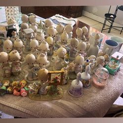 Precious Moments 50 Retired Pieces
