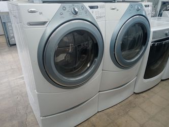 Whirlpool Duet front load washer and dryer set on pedestals - Free delivery