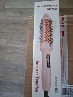 Heated brush