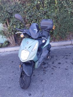 2015  Sanya matte green Lance PCH scooter.