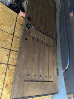 30x80 rustic distressed solid wood door with iron accents