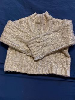 Zara’s sweater