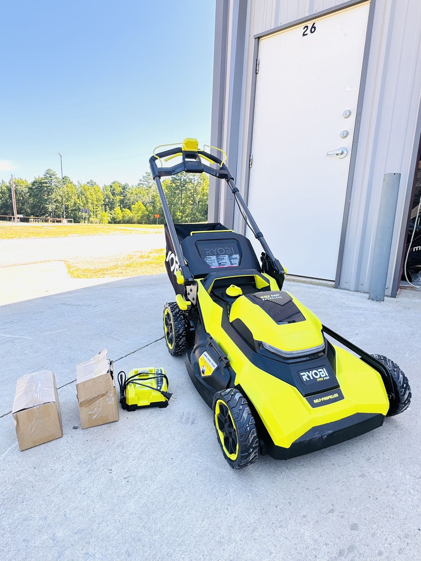 Ryobi 40V HP Brushless 21 in. Cordless Battery Walk Behind Self-Propelled Lawn Mower with (2) 6.0 Ah Batteries and Charger