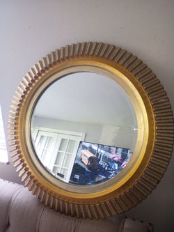 Round toned gold mirror
