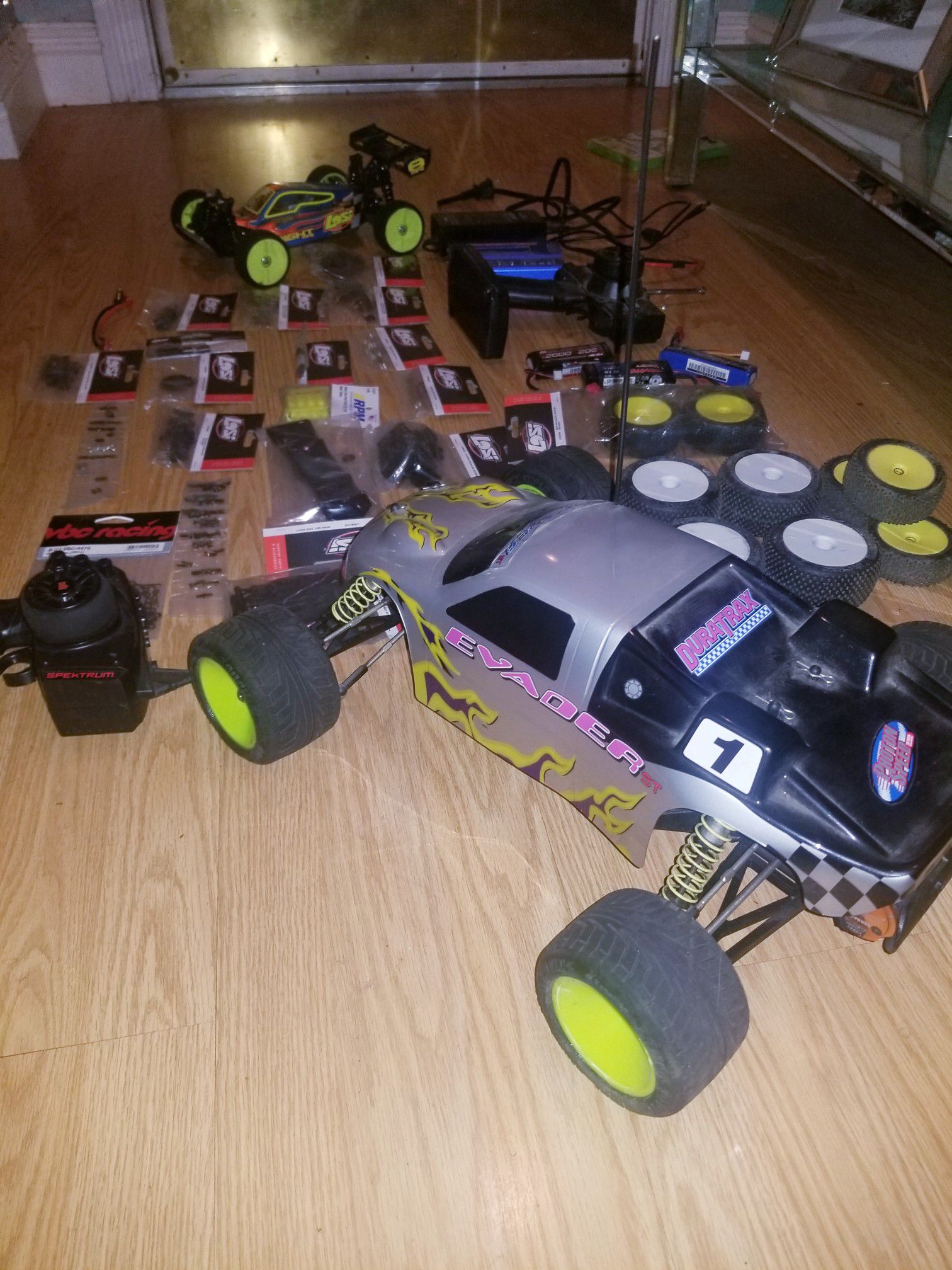 RC Truck And Buggy complete with brushless motors and Lipo batteries with bunch of brand new spare parts!