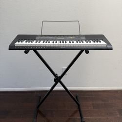 CASIO CTK-2500 PIANO KEYBOARD AND STAND