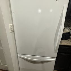 whirlpool refrigerator in great working condition with icemaker and bottom freezer ( can be pick up the first week of June ) $350 firm