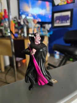 2015 McDonald's Happy Meal toy featuring Count Dracula from Hotel Transylvania 2.