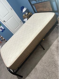 Twin metal bed fram e with mattress