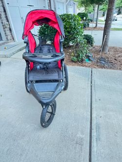 BabyTrends walking stroller red