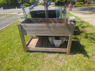 Wooden freestanding planting box prices firm