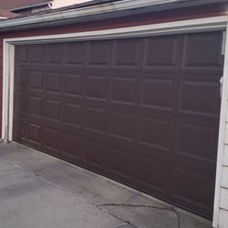 I sell insulated garage door 16x7 for two cars ...!